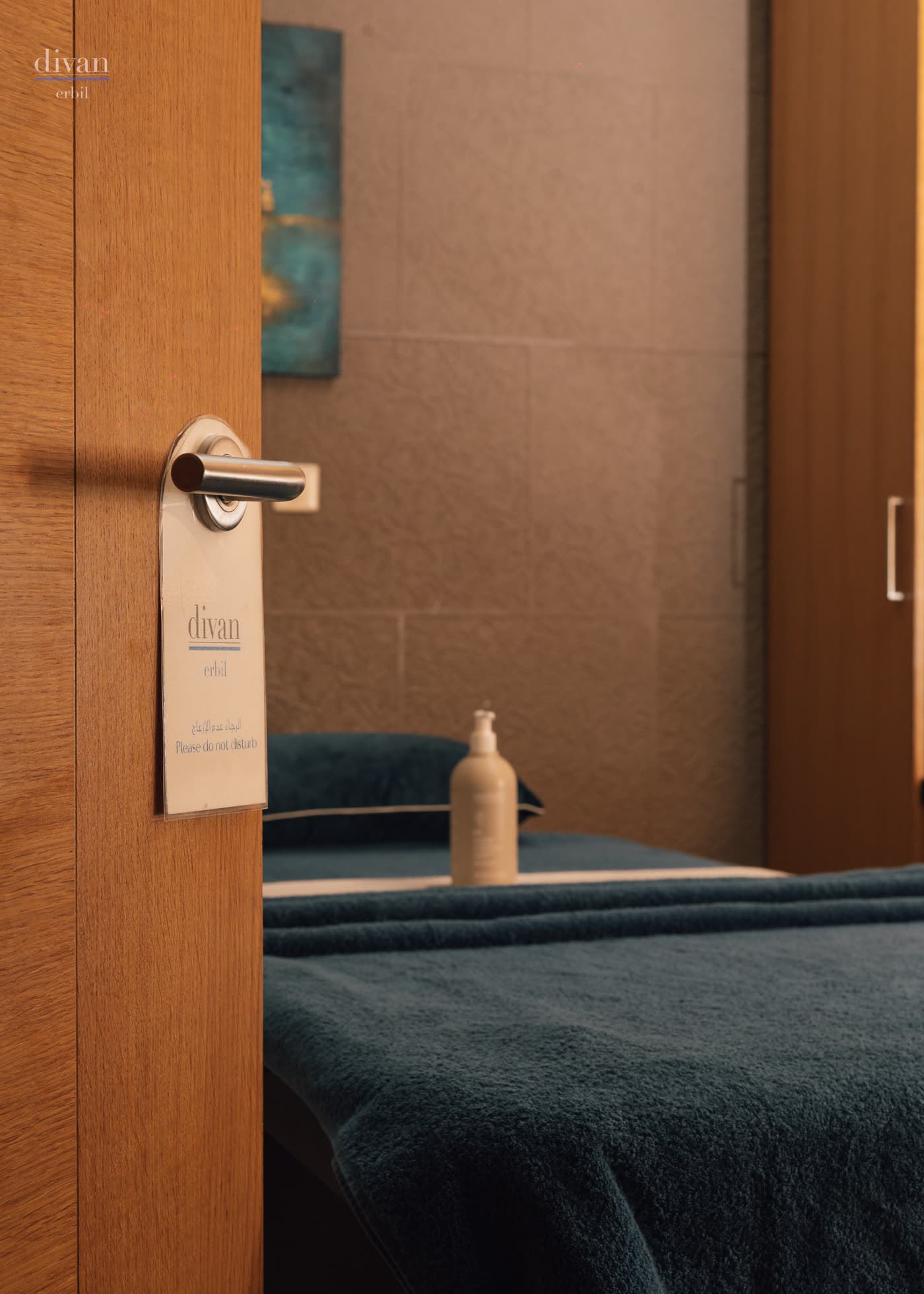 Vertical hospitality frame from Divan Spa focused on place and service.