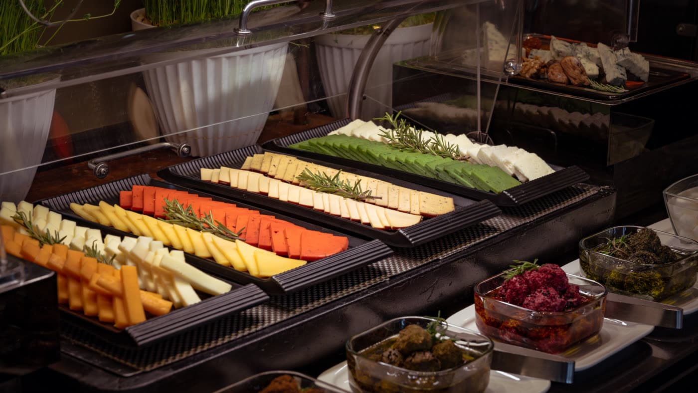 Wide plated-food frame focused on colour, texture and appetite.